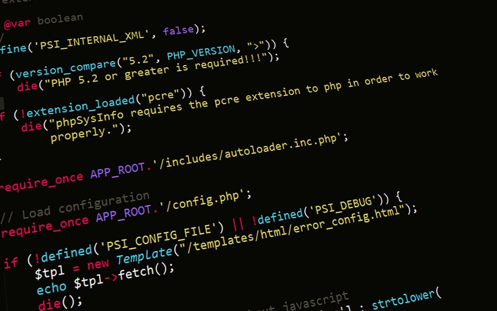PHP source code with syntax-highlighted functions and version checks on a dark background